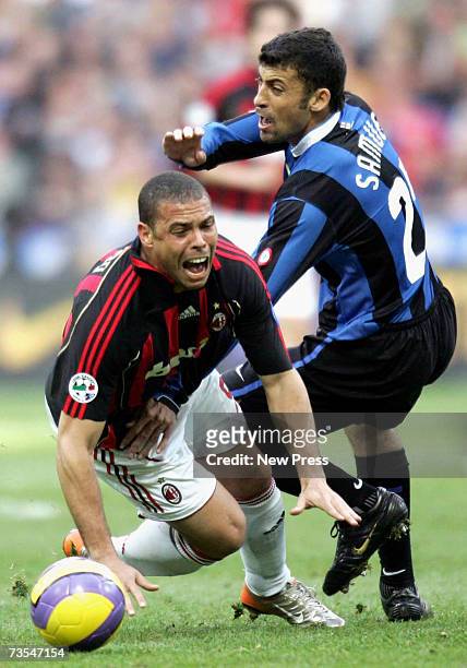 Ivan Cordoba of Inter tackles Ronaldo of AC Milan during the Serie A match between Inter Milan and AC Milanat the San Siro Stadium on March 11, 2007...