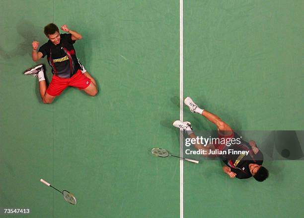 Koo Kien Keat and Tan Boon Heong of Malasia celebrate after defeating Cai Yun and Fu Haifeng of China in the Men?s Doubles final during the Yonex All...