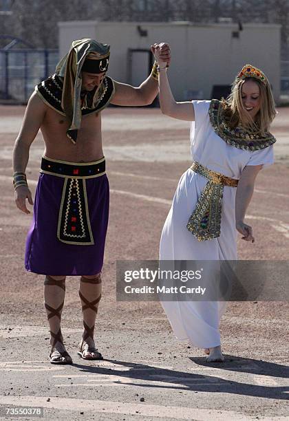 Models Shaeran Thomas and Alexander Tavares pose for pictures as the National Geographic Society announces Tutankhamun treasures are to return to the...