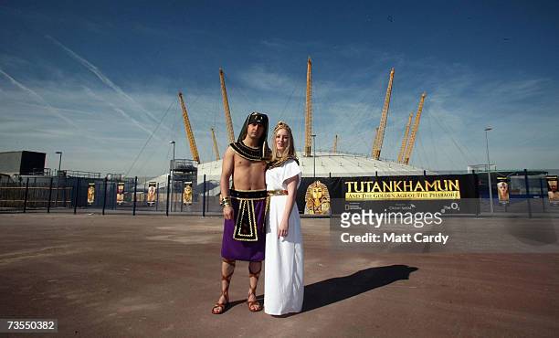 Models Shaeran Thomas and Alexander Tavares pose for pictures as the National Geographic Society announces Tutankhamun treasures are to return to the...