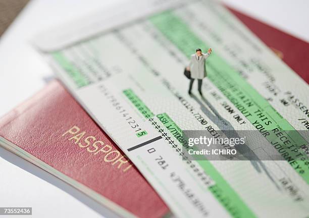 figurine with passport and plane ticket - dolls ストックフォトと画像