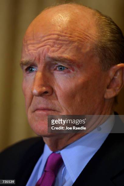 John F. Welch, Jr., Chairman and CEO of General Electric Company listens to reporters after meeting with President-elect George W. Bush January 3,...