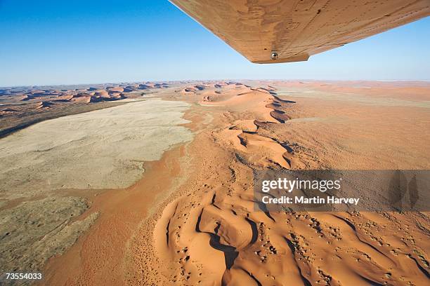 aerial view of dunes - namibia airplane stock-fotos und bilder