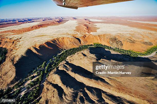 aerial view of green valley - namibia airplane stock pictures, royalty-free photos & images