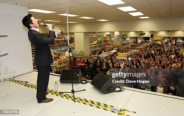 Factor' finalist Ray Quinn performs prior to an instore signing as part of a one-day tour of the UK to promote his eponymously titled debut album,...
