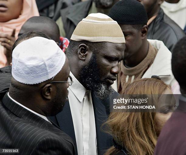 New York, UNITED STATES: Moussa Magassa leaves the Islamic Cultural Center, 12 March 2007, in the Bronx borough of New York after a funeral for...