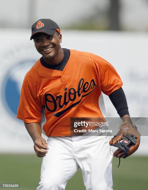 Third baseman Melvin Mora of the Baltimore Orioles fields ground balls prior to playing the Florida Marlins at Ft. Lauderdale Stadium during spring...