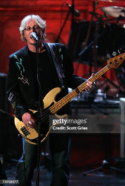 Bassist Mike Mills perform onstage at the 22nd annual Rock And Roll Hall Of Fame Induction Ceremony at the Waldorf Astoria Hotel March 12, 2007 in...