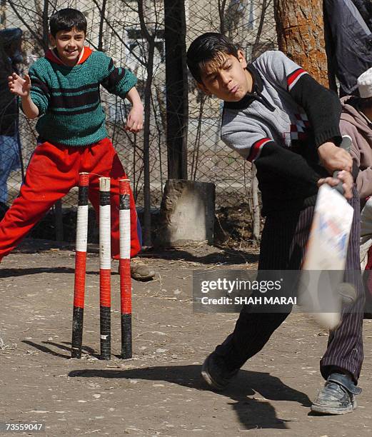 Afghan boys play cricket at a park in Kabul, 13 March 2007. Most Afghan players learnt the game as refugees in Pakistan,despite having Pakistan as a...