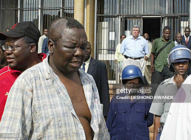 Zimbabwe opposition leader Morgan Tsvangirai leaving the court in Harare, 13 March 2007. Tsvangirai and 49 other opposition activists were given...