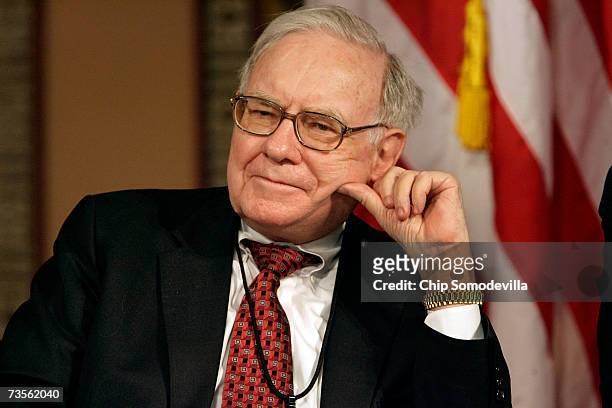 Warren Buffett, chairman and CEO of Berkshire Hathaway Inc., participates in a panel discussion, "Framing the Issues: Markets Perspectives," at...