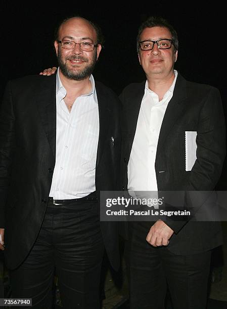 Distributor Adel Adeeb of Good News Company poses with Distributor Jean-Michel Rey of Rezo Film as they arrive to attend the screening of French...