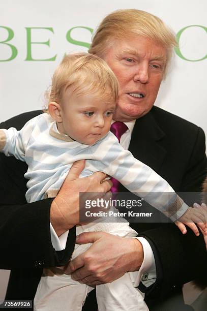 Donald Trump and son Barron attend the 16th Annual Bunny Hop at FAO Schwartz to benefit the Memorial Sloan-Kettering Cancer Center March 13, 2007 in...