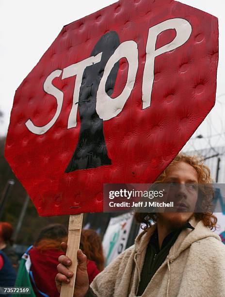 Campaigners protest at the Faslane naval base on the Clyde, home of the Trident Submarine fleet, March 14, 2007 in Faslane, Scotland. MPs will take a...