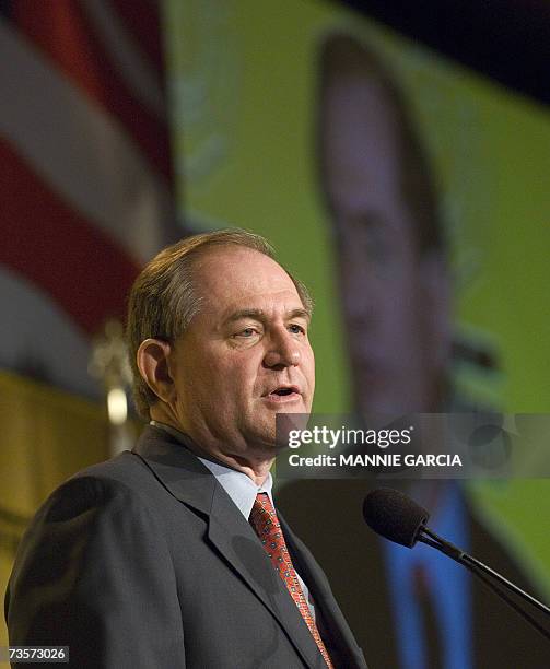 Washington, UNITED STATES: Former Republican Governor of Virginia and presidential hopeful Jim Gilmore speaks at the International Association of...