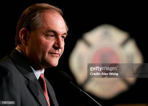 Former Virginia Gov. Jim Gilmore speaks to members of International Association of Fire Fighters during a bipartisan presidential forum March 14,...