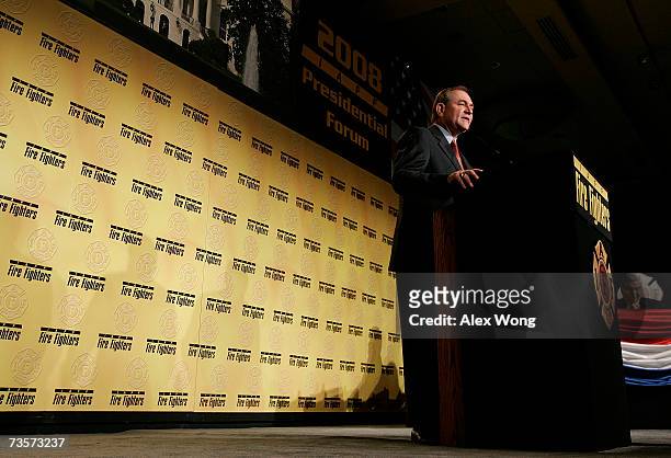Former Virginia Gov. Jim Gilmore speaks to members of International Association of Fire Fighters during a bipartisan presidential forum March 14,...