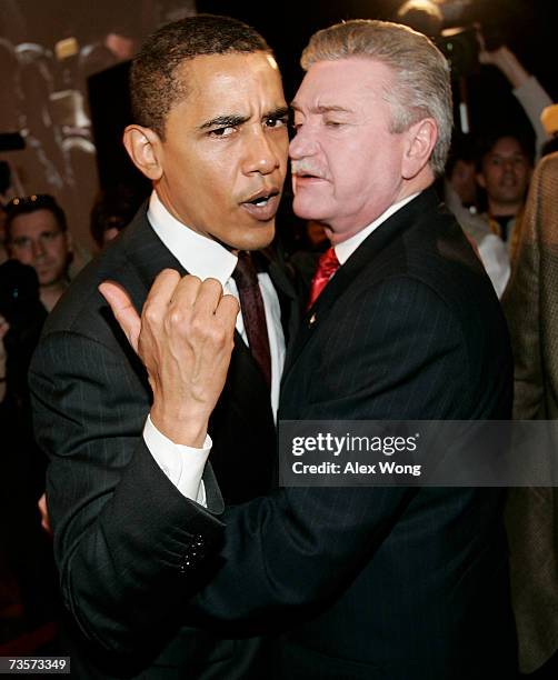 Sen. Barack Obama hugs Harold Schaitberger, general president of the International Association of Fire Fighters during a bipartisan presidential...