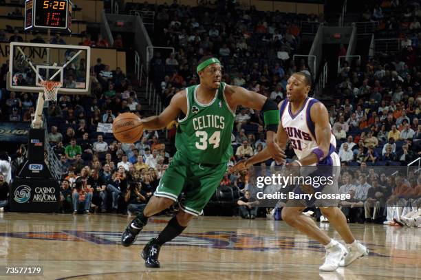 Paul Pierce of the Boston Celtics moves against Shawn Marion of the Phoenix Suns at US Airways Center on February 21, 2007 in Phoenix, Arizona. The...