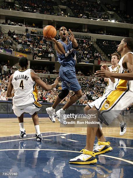 Antawn Jamison of the Washington Wizards drives the lane past Shawne Williams of the Indiana Pacers on March 14, 2007 at Conseco Fieldhouse in...