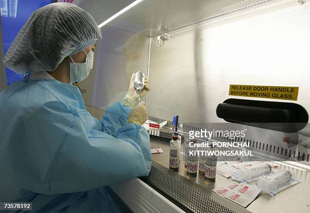 Thai officer checks blood during the stem cells process at Stem Life Company in Bangkok, 01 March 2007. Thai parents often mark the birth of a child...