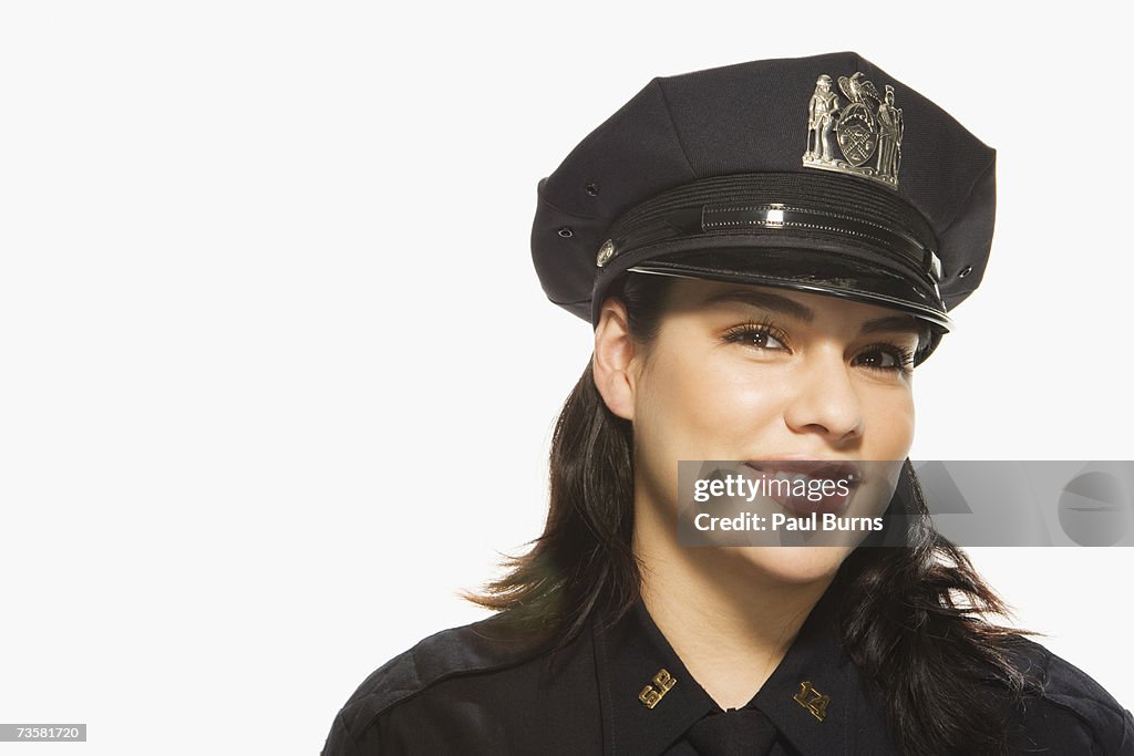 Female Police Officer on white background, portrait