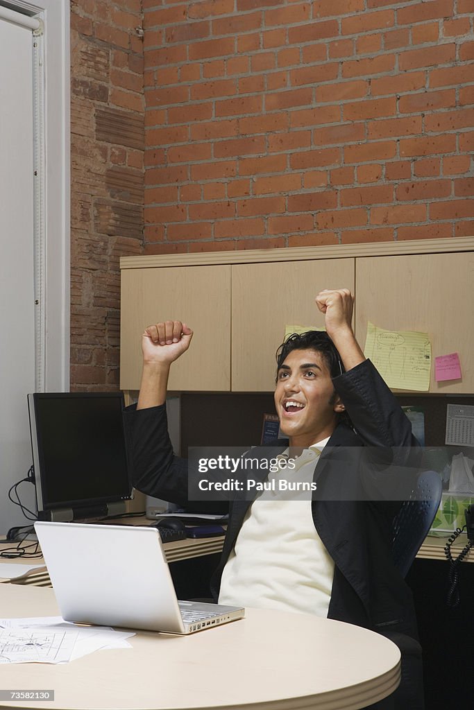 Workman Cheering Male Office Worker Cheering At Desk High-Res Stock Photo - Getty Images