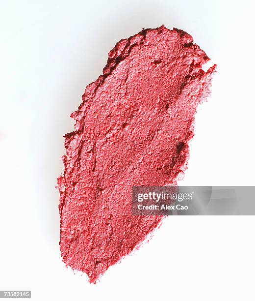 smear of pink lipstick on white background - pink lipstick smear stock pictures, royalty-free photos & images