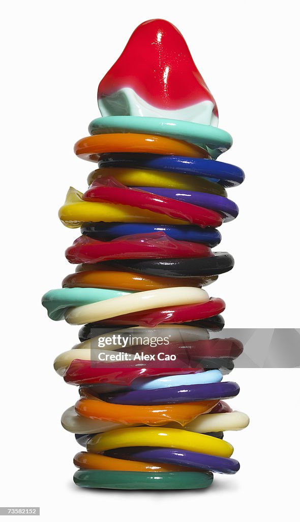 Stack of multi-colored condoms