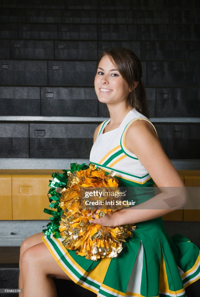 Young cheerleader, smiling, portrait