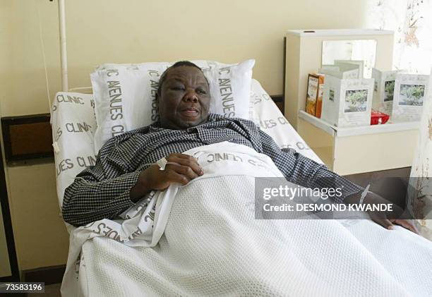 Zimbabwean opposition leader Morgan Tsvangirai is seen in bed at a local hospital in Harare, 14 March 2007. Tsvangirai was in intensive care after...