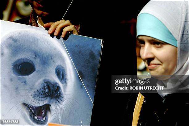 The Hague, NETHERLANDS: The 'Bont voor dieren' association protested against seal hunting in Canada at the Canadian Embassy in The Hague 15 March...