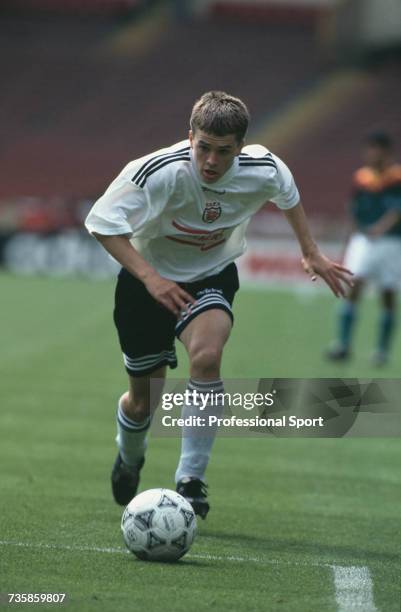 English footballer Michael Owen pictured in action making a run with the ball during an Under 15 game between England and Germany on 10th June 1995....