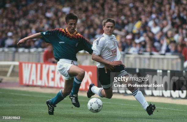 English footballer Michael Owen pictured on right trying to gain possession of the ball from a German player during an Under 15 game between England...