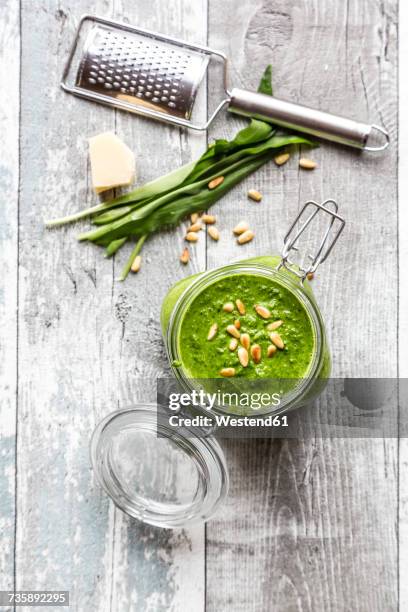 glass of homemade ramson pesto - pine nut stock pictures, royalty-free photos & images