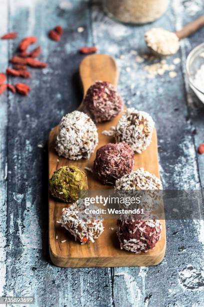 various bliss balls on wooden board - hemp seed fotografías e imágenes de stock