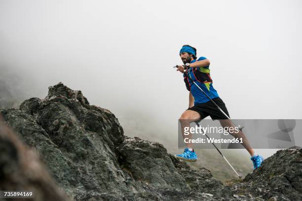italy, alagna, trail runner on the move near monte rosa mountain massif - trail running stock pictures, royalty-free photos & images