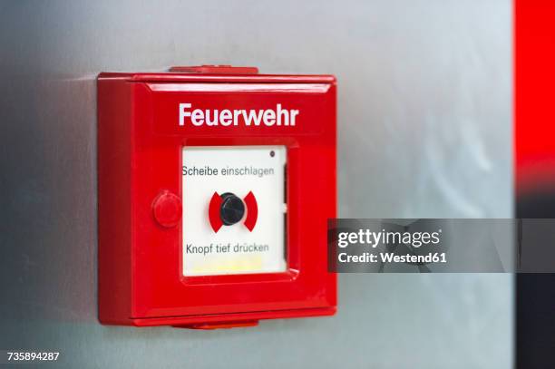 fire alarm at wall - feuerwehr deutschland stock-fotos und bilder