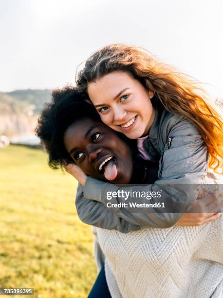 two best friends having fun outdoors - harmony day stock pictures, royalty-free photos & images