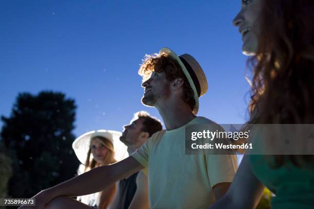 friends watching starry sky - looking up at stars stock pictures, royalty-free photos & images