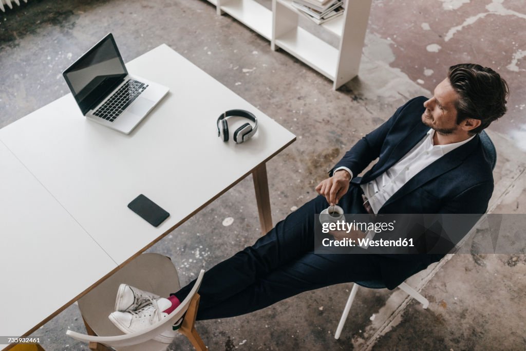 Businessman having a coffee break