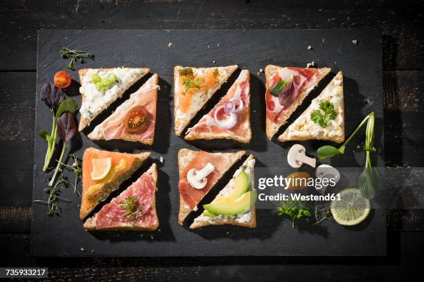 various garnished sandwiches - bacon sandwich stock pictures, royalty-free photos & images