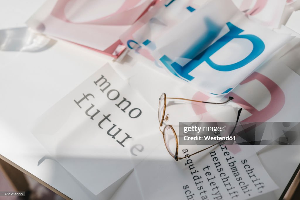 Glasses and script templates on table