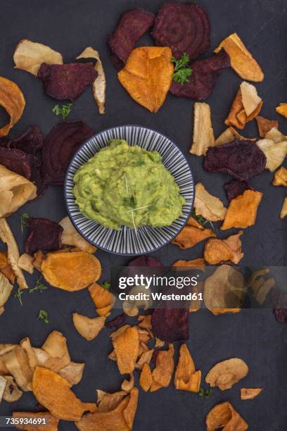 vegetable chips with avocado dip and cress - vegetable chips stock pictures, royalty-free photos & images