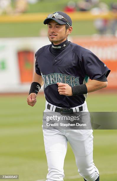 Ichiro Suzuki of the Seattle Mariners jogs off the field against the Chicago Cubs during Spring Training at Peoria Sports Complex March 5, 2007 in...