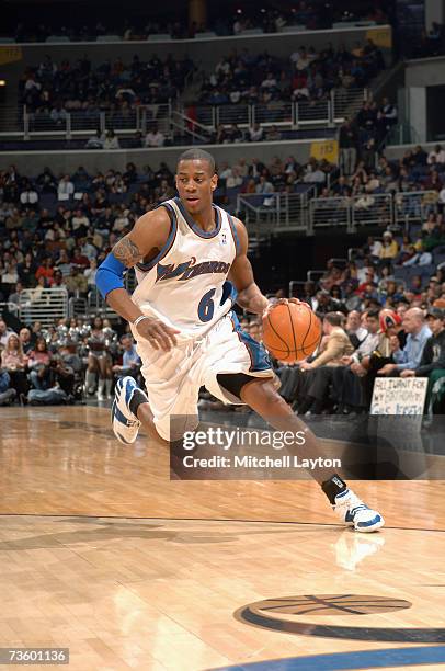 Antonio Daniels of the Washington Wizards moves the ball against the Minnesota Timberwolves during the game at the Verizon Center on February 20,...