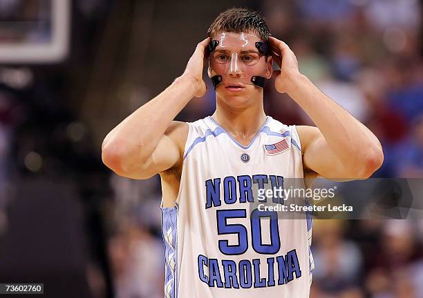 Tyler Hansbrough of the North Carolina Tar Heels adjusts his mask in the second half against the Eastern Kentucky Colonels during round one of the...