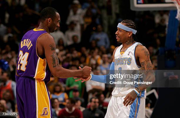 Kobe Bryant of the Los Angeles Lakers and Allen Iverson of the Denver Nuggets greet each other before the tip off during NBA action at the Pepsi...