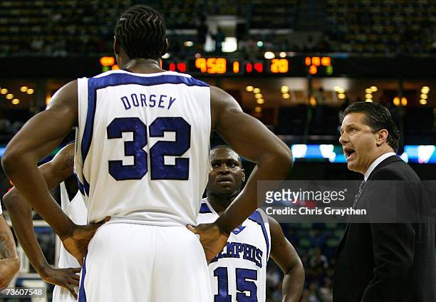 Head coach John Calipari of the Memphis Tigers talks to his team during a break in the first half of round one of the NCAA Men's Basketball...
