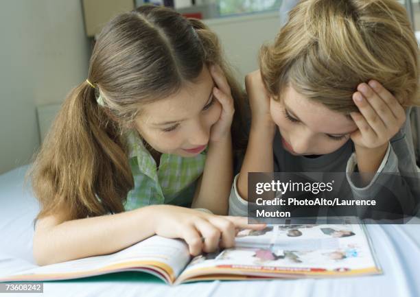 Sharing Books Children Sharing Books Photos and Premium High Res Pictures - Getty Images